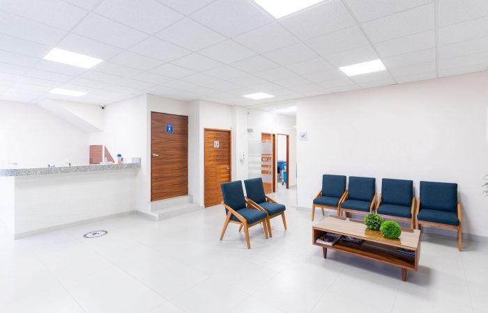 Bright and clean medical waiting room with modern seating and decor.