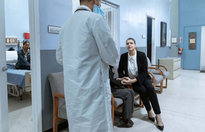 Doctors and patients in a hospital environment, fostering care and companionship.