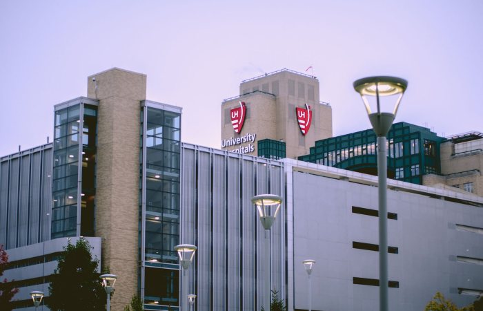 View of University Hospitals building in Cleveland, OH against a clear sky.